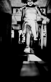 Low section of woman standing on floor