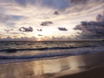 Scenic view of sea against sky at sunset