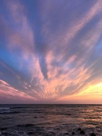 Scenic view of sea against dramatic sky