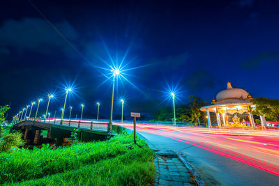 Illuminated street light at night