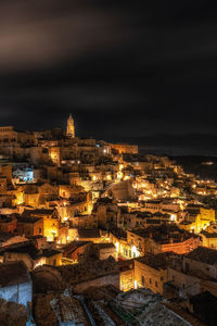 Illuminated buildings in city at night