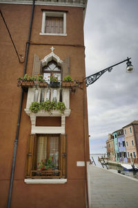 Low angle view of residential building against sky