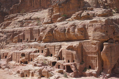 Low angle view of rock formations and ancient ruins