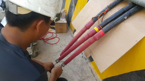 Portrait of man working on wood