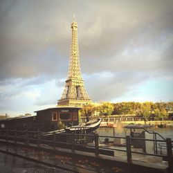 View of tower against cloudy sky