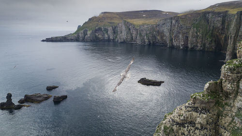 Scenic view of sea and mountains