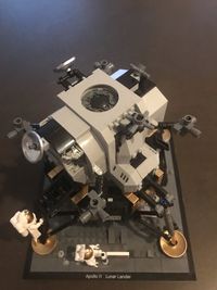 High angle view of camera on table against black background