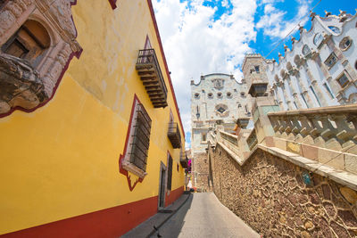 Low angle view of buildings against sky