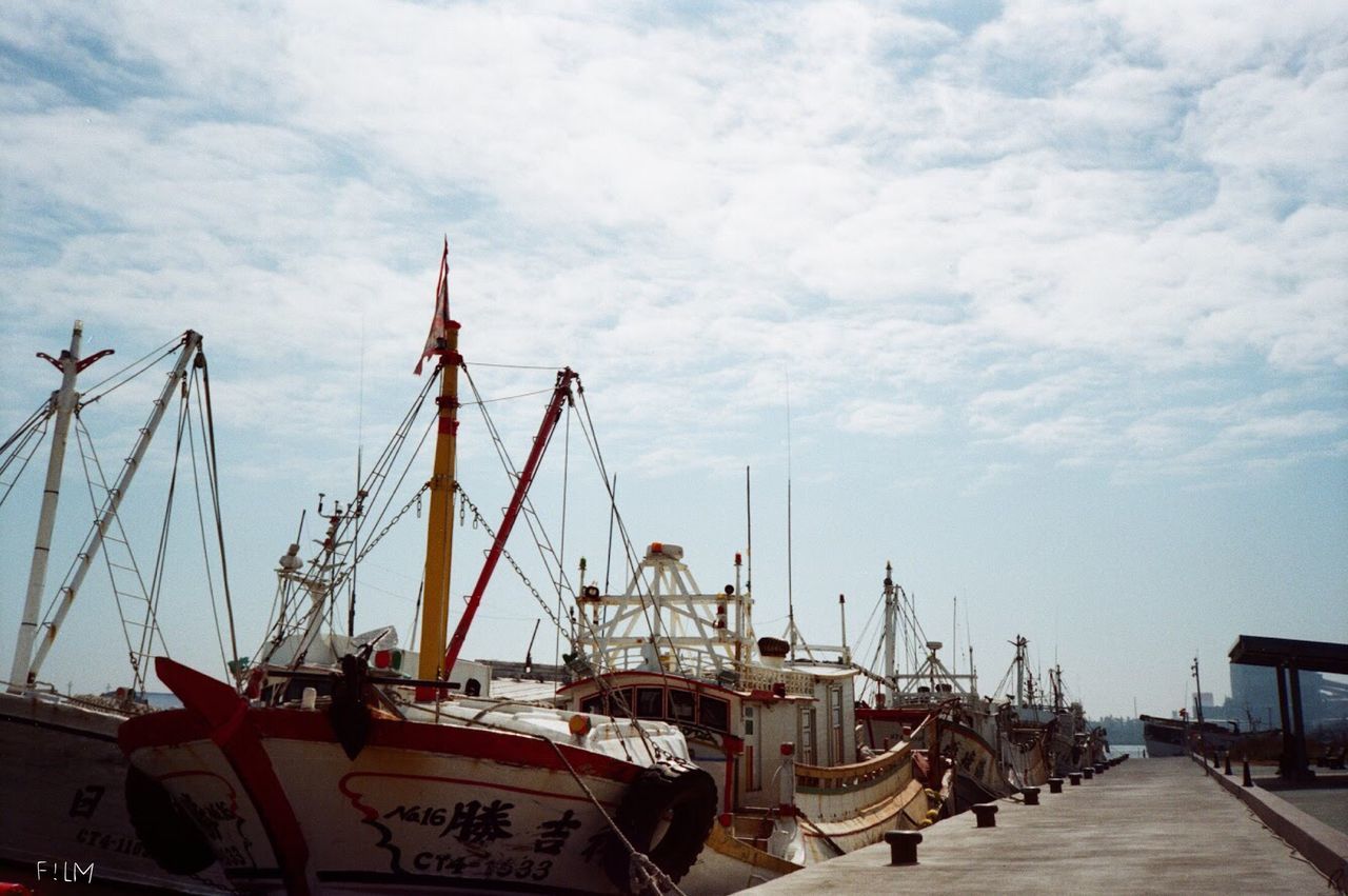 nautical vessel, mode of transportation, transportation, sky, sailboat, harbor, moored, cloud - sky, mast, water, sea, nature, pole, ship, travel, day, no people, pier, commercial dock, outdoors, port, yacht, luxury, fishing boat, marina