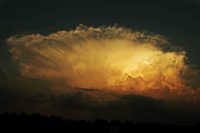 Scenic view of cloudy sky at sunset