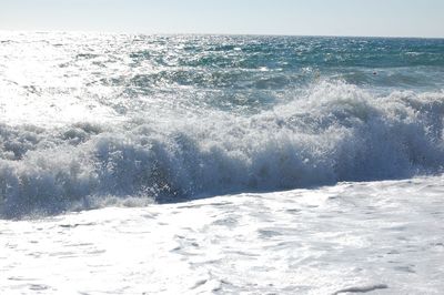 Waves splashing on rocks