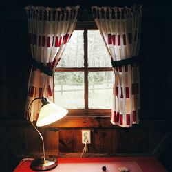 Chairs and table against window