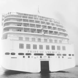 View of building by sea against sky