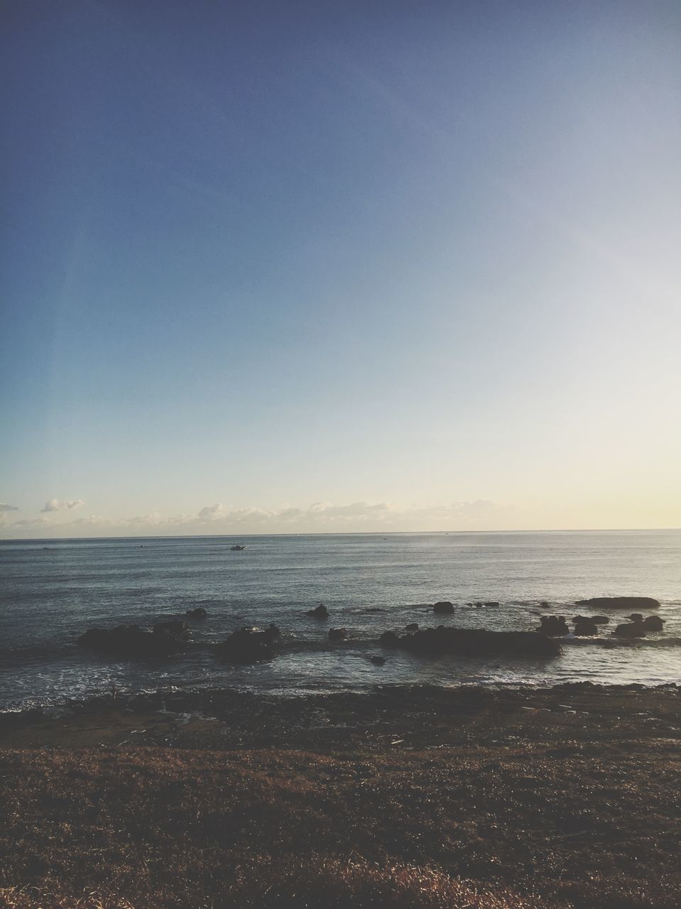 sea, beach, water, horizon over water, nature, scenics, beauty in nature, tranquil scene, tranquility, sand, outdoors, wave, no people, clear sky, travel destinations, tide, sky, vacations, day