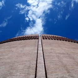 Low angle view of roof against blue sky