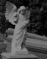 Low angle view of statue against sky