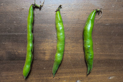 Close-up of green chili pepper on table