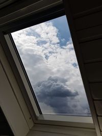 Low angle view of skylight in building