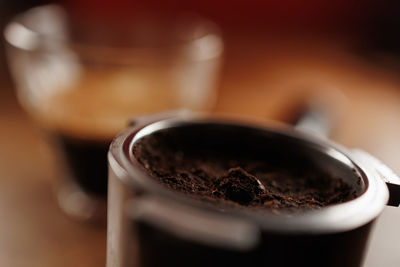 Holder of espresso coffee machine on wooden table