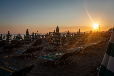 Panoramic view of beach against sky during sunset