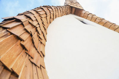 Low angle view of roof against sky