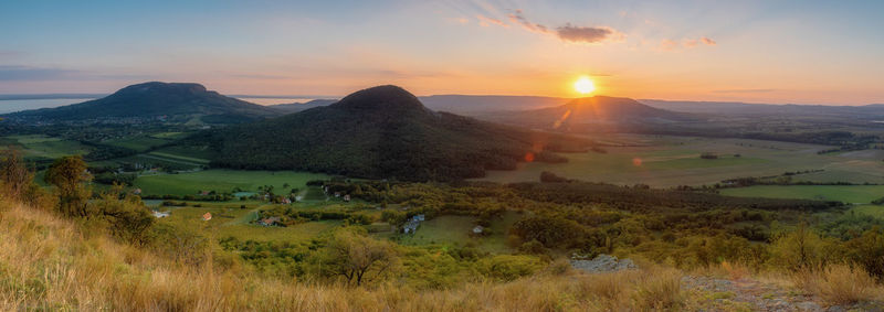 Beautiful hungarian sunset with old volcanoes near the lake balaton