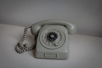 High angle view of telephone on table