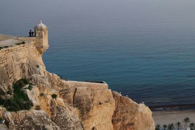 High angle view of lighthouse at seaside