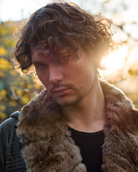 Close-up of young man looking away