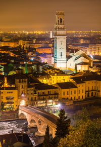 High angle view of illuminated buildings in city