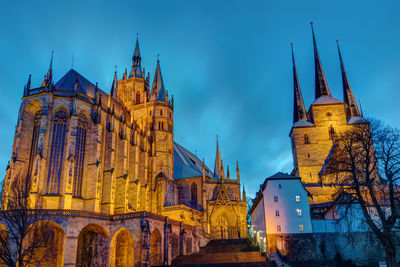 The famous cathedral and severi church in erfurt illuminated after sunset