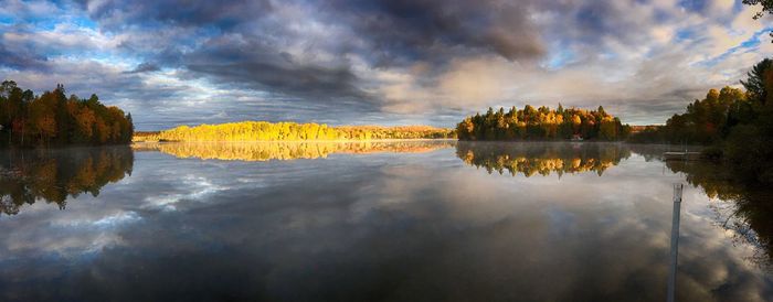 Reflection of clouds in calm lake