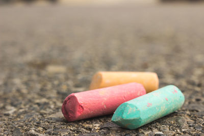 Close-up of cigarette on ground