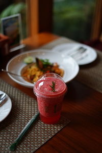 Close-up of drink served on table