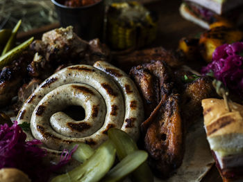 High angle view of meat on barbecue