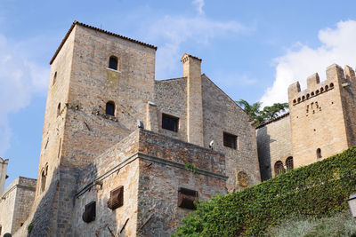 Low angle view of historic building against sky