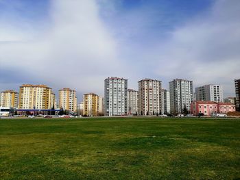 Buildings in city against sky