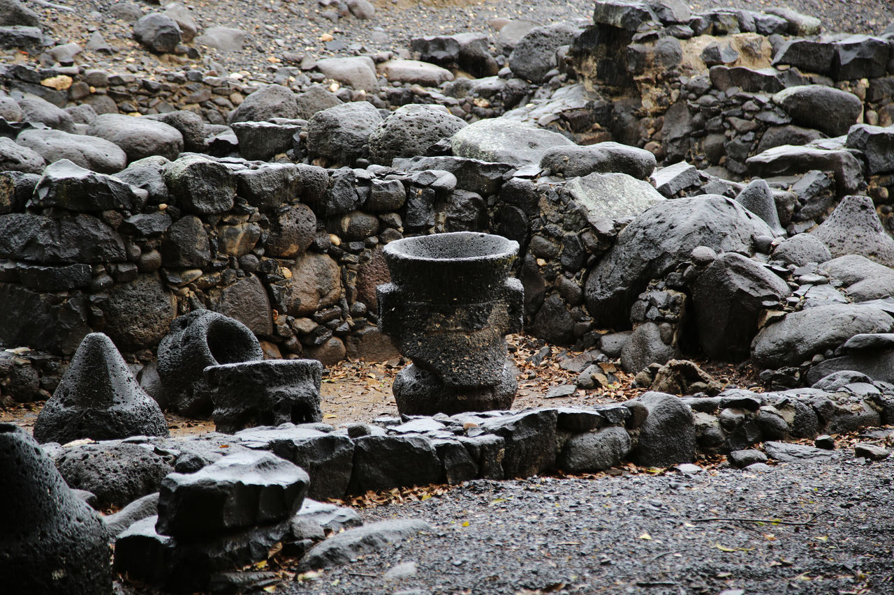 HIGH ANGLE VIEW OF STONE STACK ON ROCKS