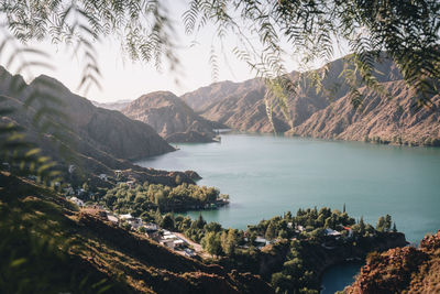 Scenic view of sea against mountains