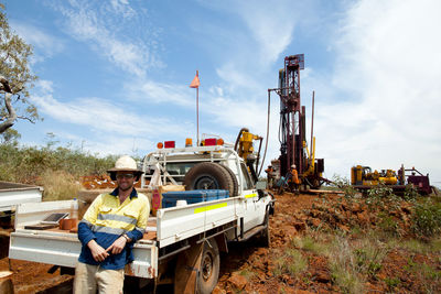 Portrait of man working at construction site