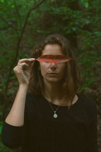 Portrait of woman wearing sunglasses