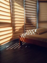 Sunlight falling on bed at home