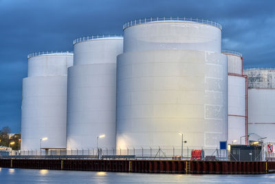 Fuel storage tanks at night seen in berlin, germany