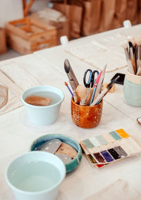 High angle view of coffee cup on table