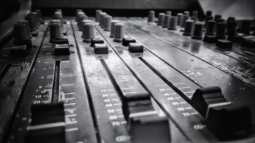 Close-up of sound mixer in studio