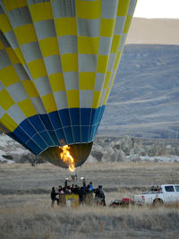 Preparing hot air balloon ready for take off