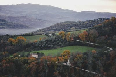 Scenic view of landscape against sky during autumn