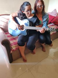 Friends sitting at home