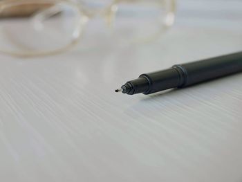 High angle view of pen on table