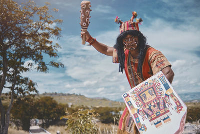 Representation of inca warrior dressed and with battle weapons, prehispanic warrior fighting in peru